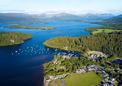 An aerial view of Balmaha by Loch Lomond