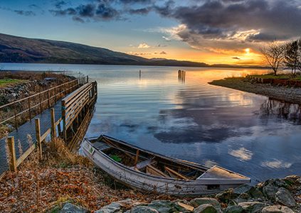 Looking out to a sunset over Loch Lomond at Luss