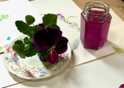 Purple flower and art materials