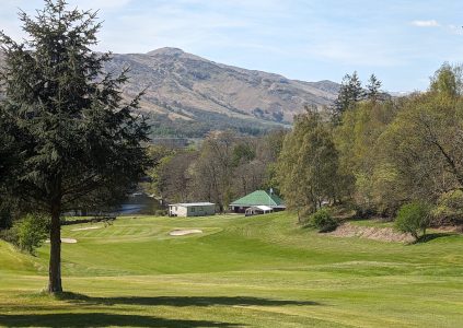 View of Killin Golf Club with mountains in the background