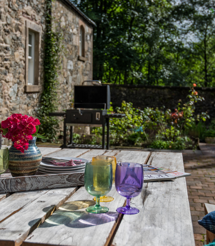Outdoor seating and BBQ at Stuckdarach House