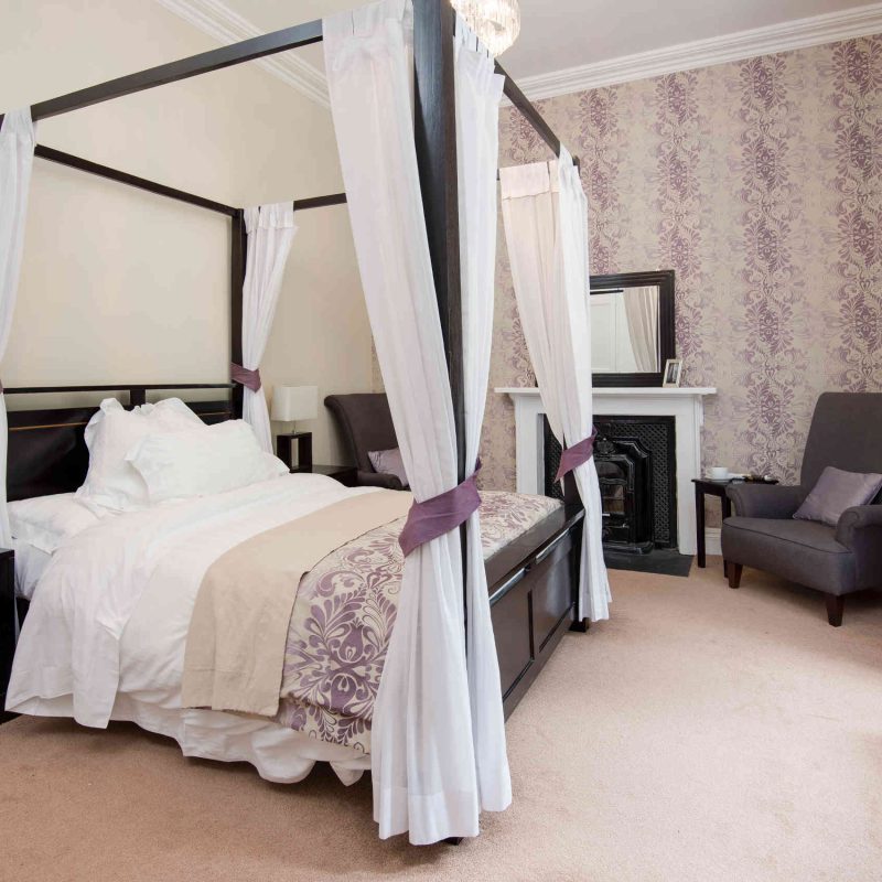 Bedroom with four poster bed