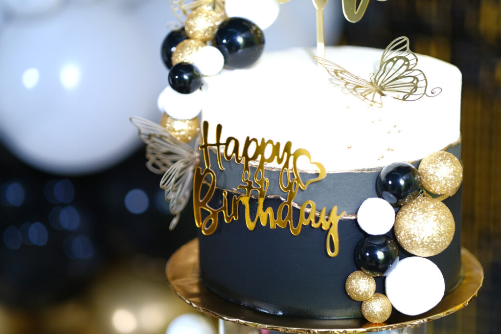 Black, white and gold birthday cake