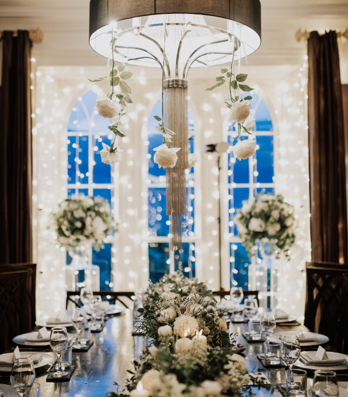 Tables decorated with flowers and candles for a wedding